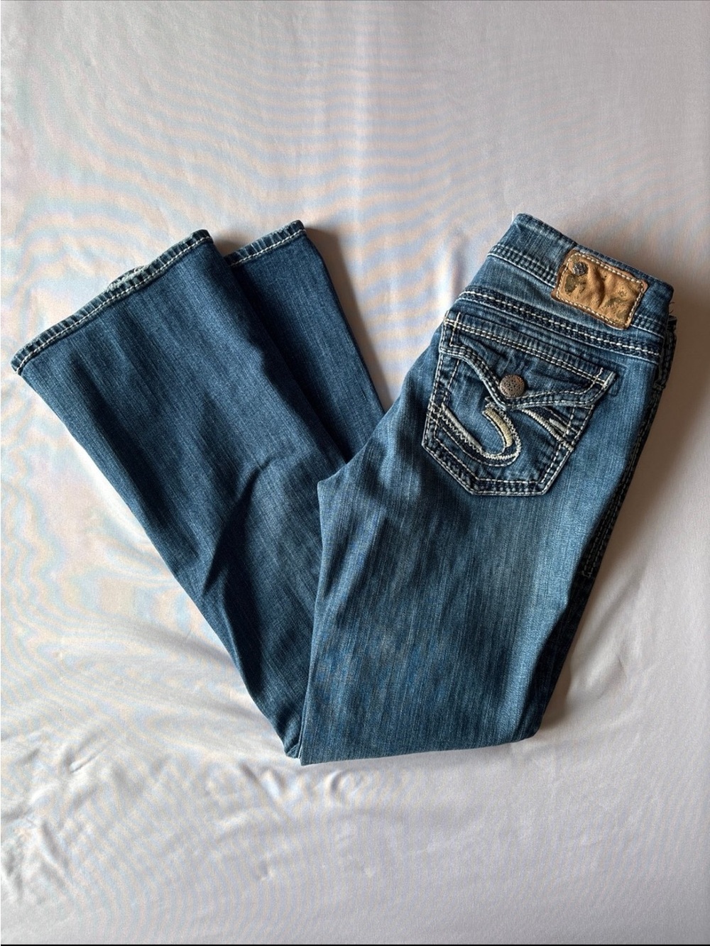 Silver Jeans Blue Bootcut Denim with Embroidered Back Pocket
